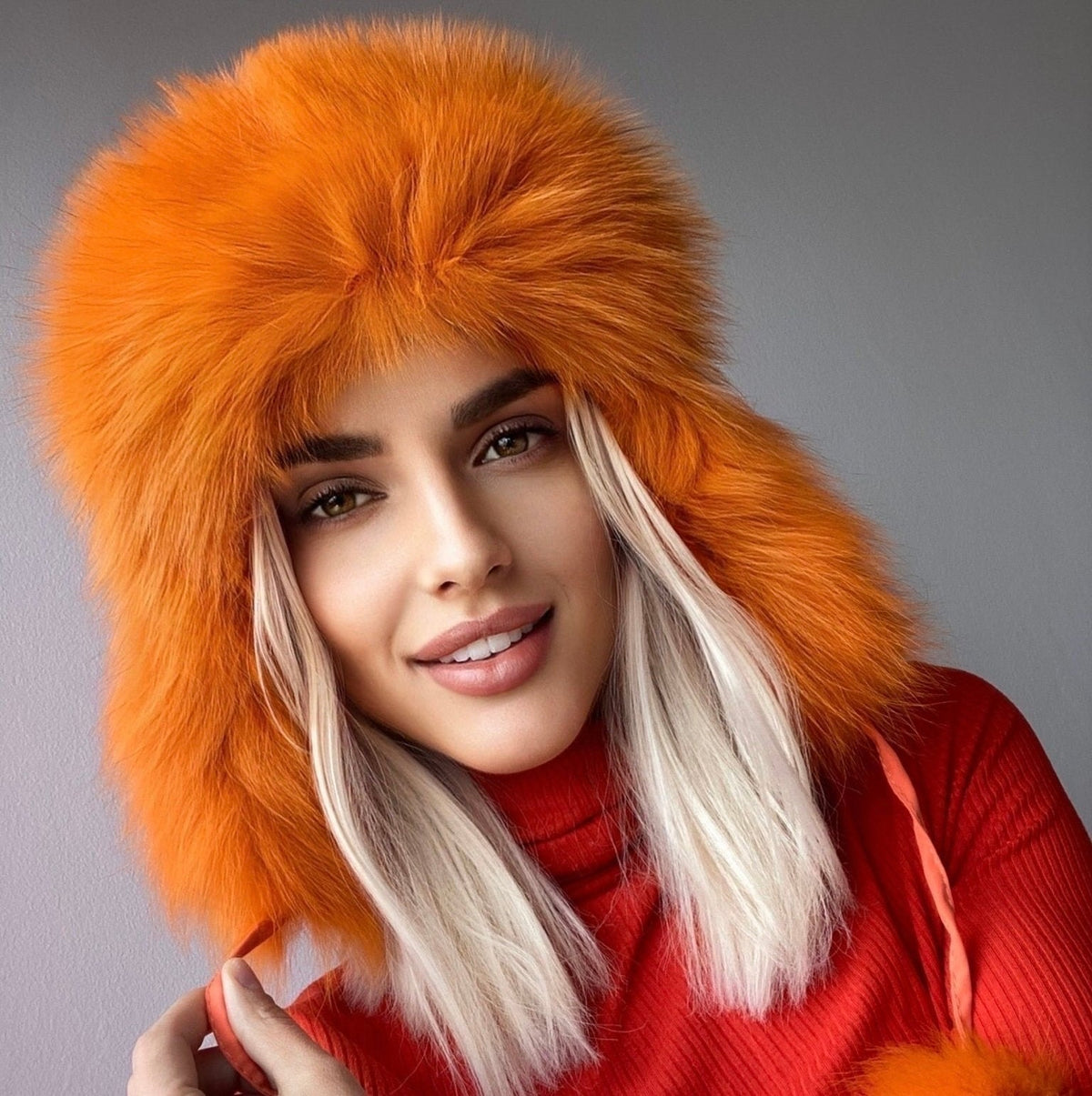Czapka z futra uszatka z lisa damska,pomarańczowa LIS-1-LEU. Czapka z futra naturalnego damska.